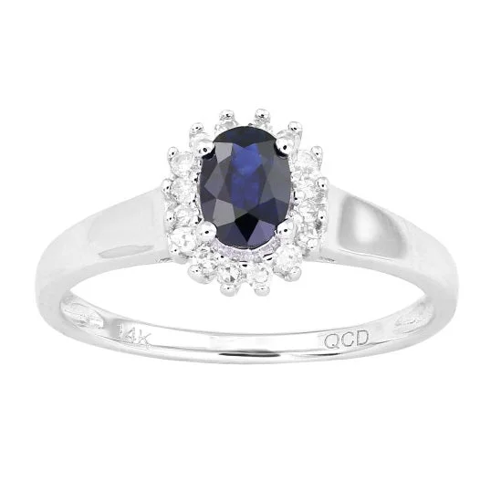 women's engagement rings with timeless design -6X4MM Blue Sapphire and Diamond Halo Ring in 10KT White Gold