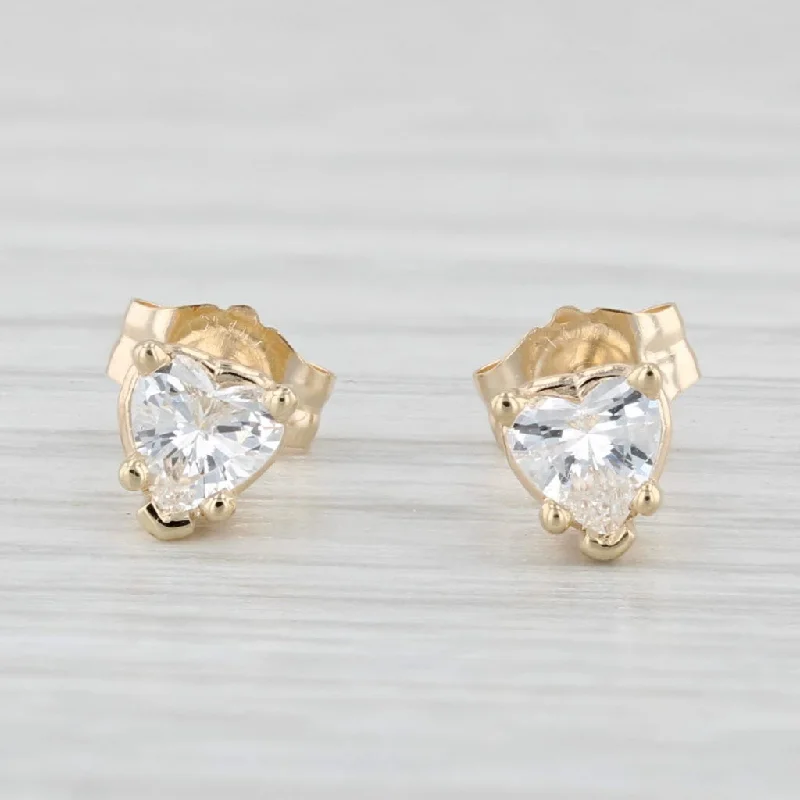 women's earrings with artistic design -0.34ctw Diamond Heart Solitaire Stud Earrings 14k Yellow Gold