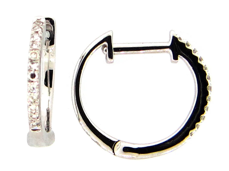 women's earrings with elongated drop -Lady's White 14 Karat Huggie Earrings 0.08tw Round Diamonds