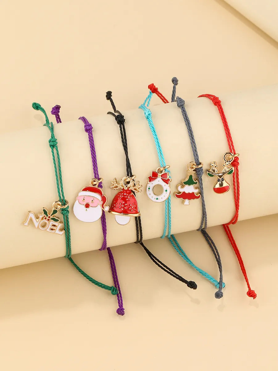 women's bracelets with round charm -Cute Simple Style Christmas Hat Christmas Tree Santa Claus Alloy Enamel Plating Christmas Women's Bracelets