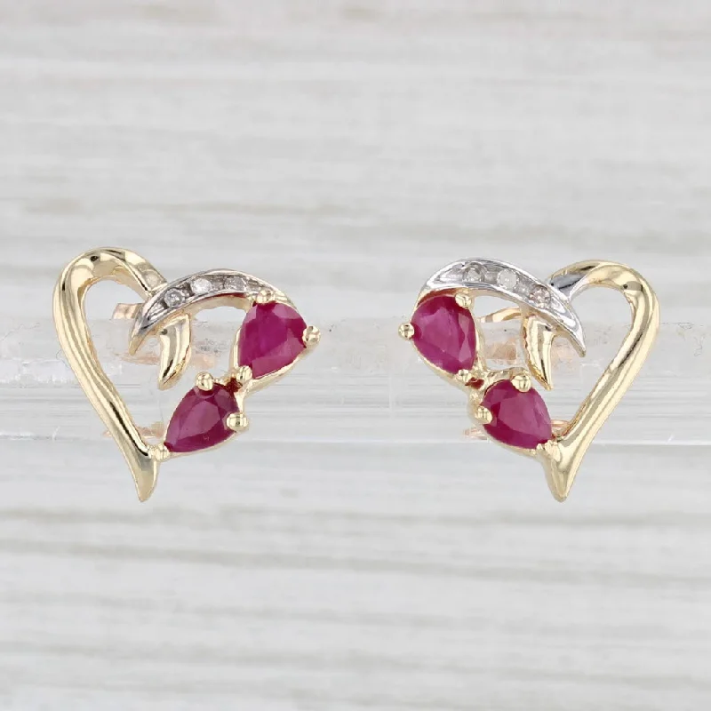 women's earrings with fine details -0.80ctw Ruby Diamond Heart Stud Earrings 14k Yellow Gold