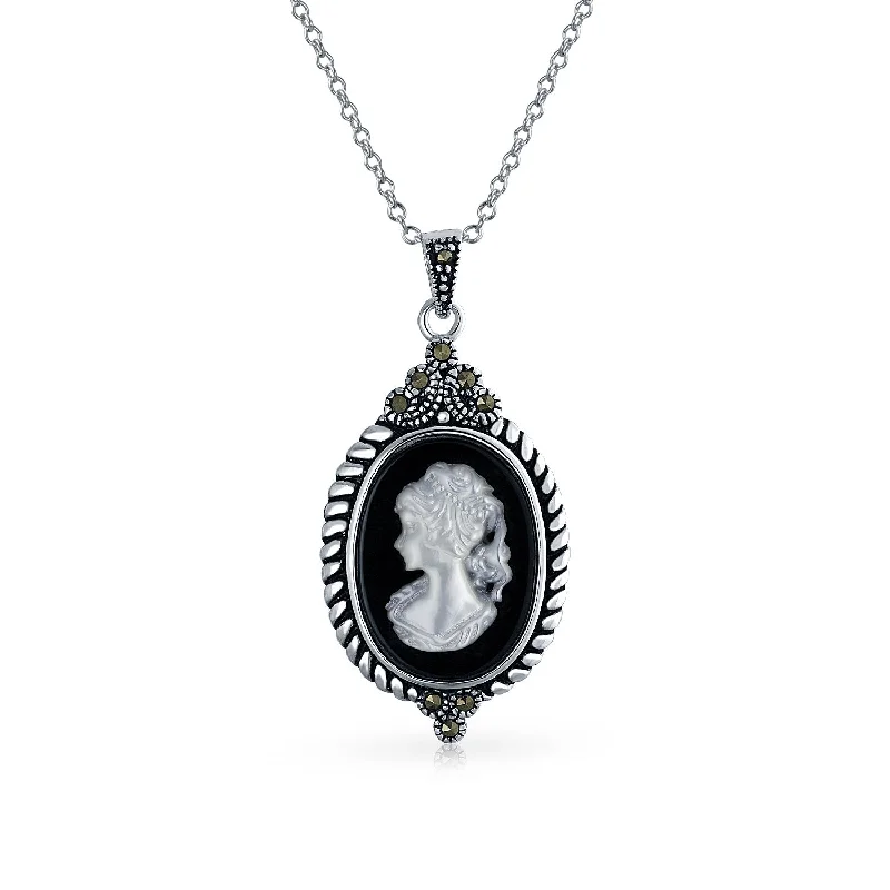 women's necklaces with star-shaped pendant -Vintage Black Mother of Pearl Cameo Pendant Necklace in Sterling Silver Frame