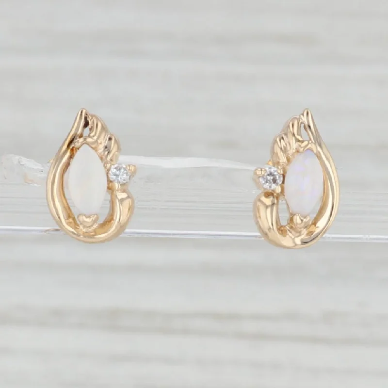 women's earrings with unique style -Lab Created Opal Cubic Zirconia Stud Earrings 10k Yellow Gold Teardrop Studs