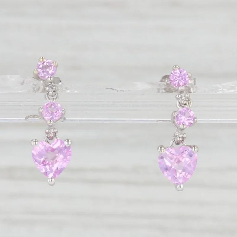 women's earrings with cubic zirconia accents -1.55ctw Lab Created Pink Sapphire Heart Dangle Earrings 10k Gold Pierced Drops