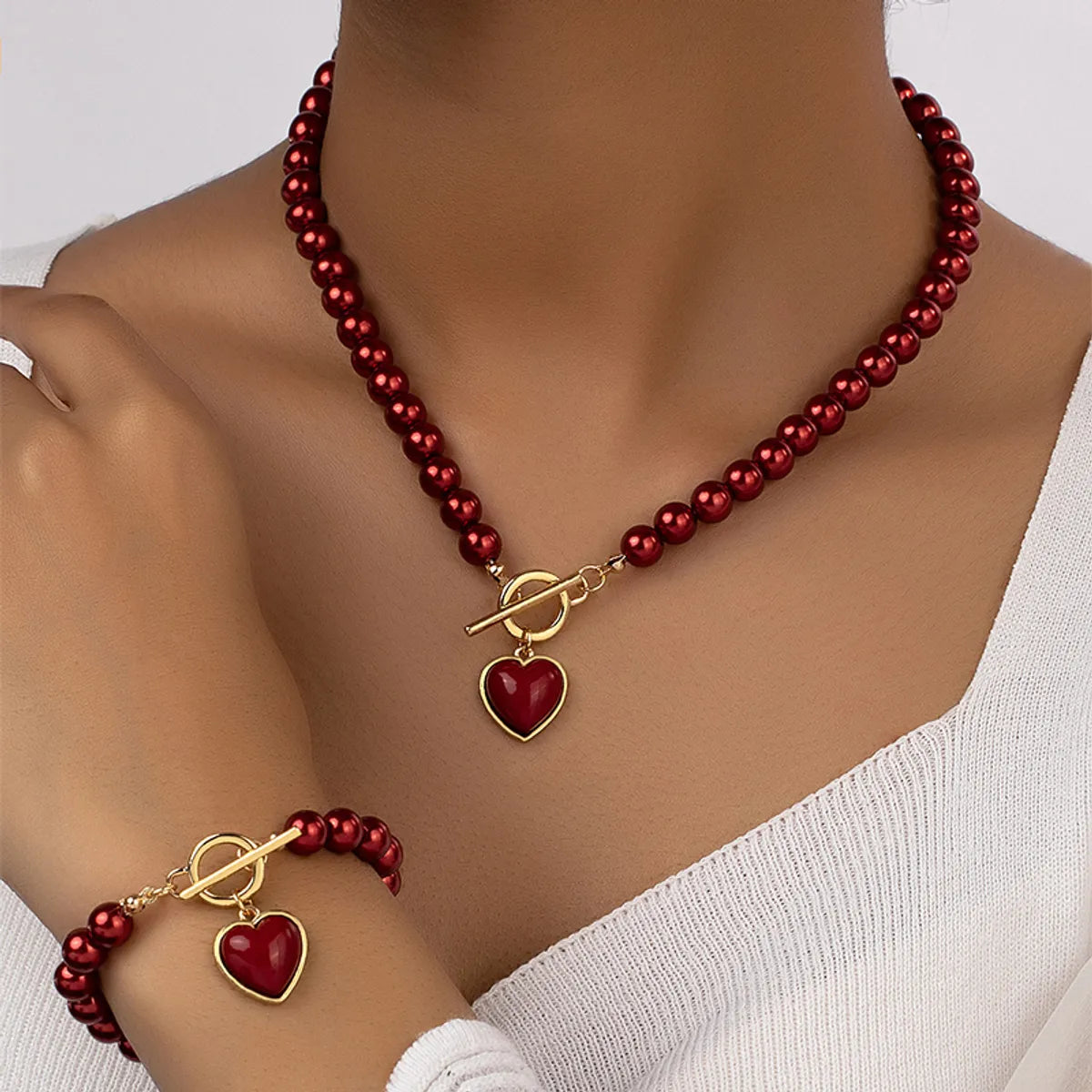 women's bracelets with geometric design -Elegant Glam Lady Heart Shape Arylic Imitation Pearl Alloy Plating 14k Gold Plated Women's Bracelets Necklace