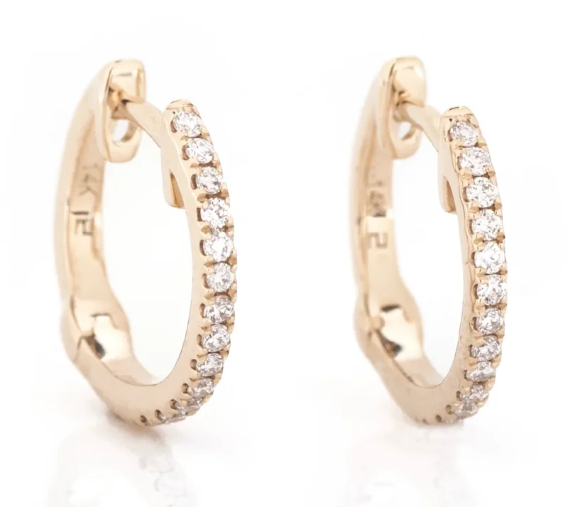 women's earrings with gemstone bezel -Lady's Yellow 14 Karat Huggie Earrings 26=0.13tw Round Diamonds 9MM