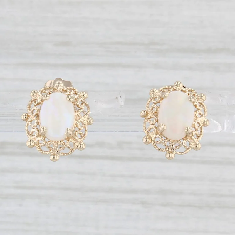 women's earrings with oval gemstones -Vintage Filigree Opal Solitaire Stud Earrings 10k Yellow Gold