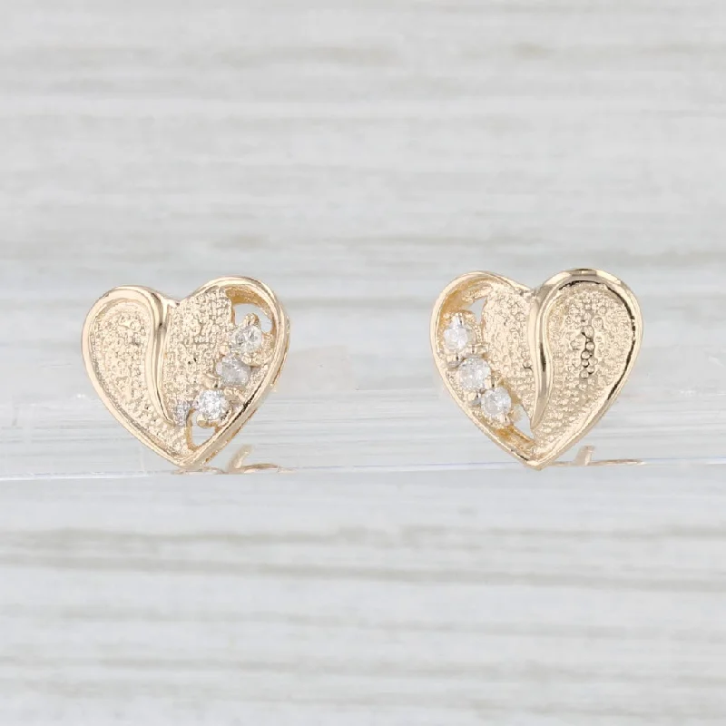 women's earrings with silver-plated finish -Diamond Accented Heart Stud Earrings 14k Yellow Gold