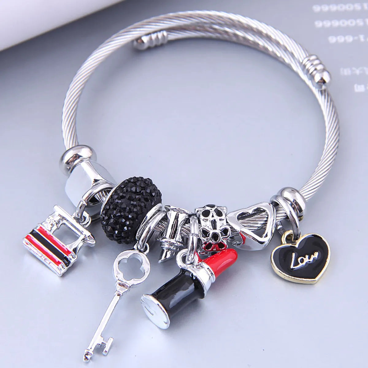 women's bracelets with woven design -Nihaojewelry Wholesale Jewelry Simple Heart Lock Lipstick Multi-Element Pendant Bracelet