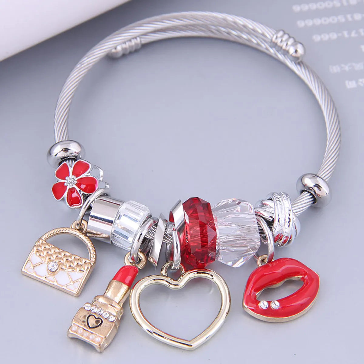 women's bracelets with smooth finish -Nihaojewelry Wholesale Jewelry Fashion Metal Bag Lipstick Heart Lips Multi-Element Pendant Bracelet