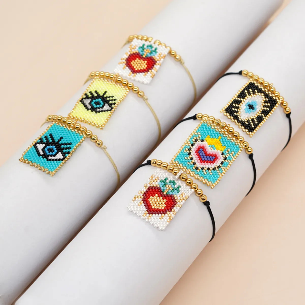 women's bracelets with luxury plating -Casual Peach Eye Smile Face Glass Beaded Braid Woven Belt Women'S Bracelets