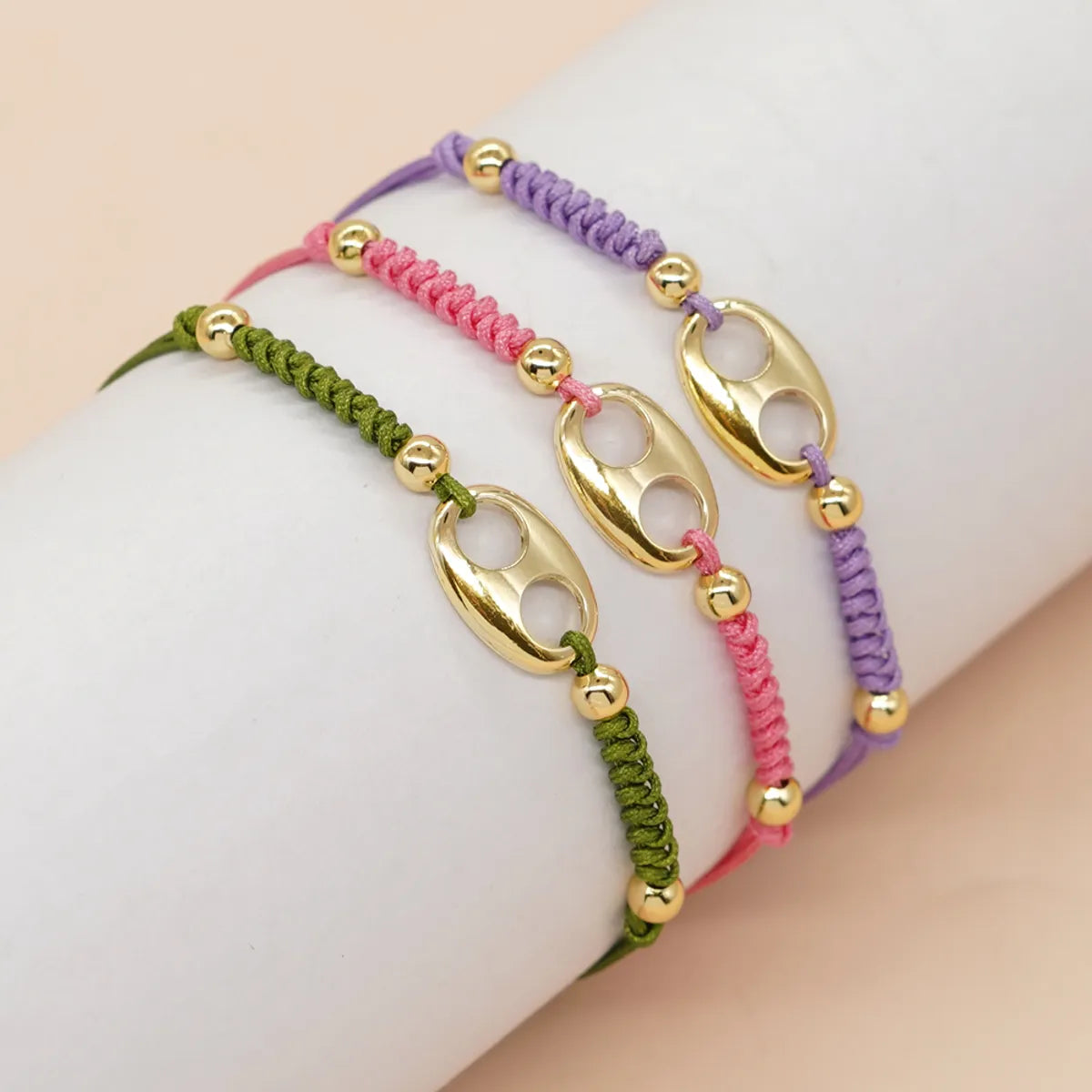 women's bracelets gold -Casual Simple Style Oval Rope Copper Knitting Hollow Out Unisex Bracelets