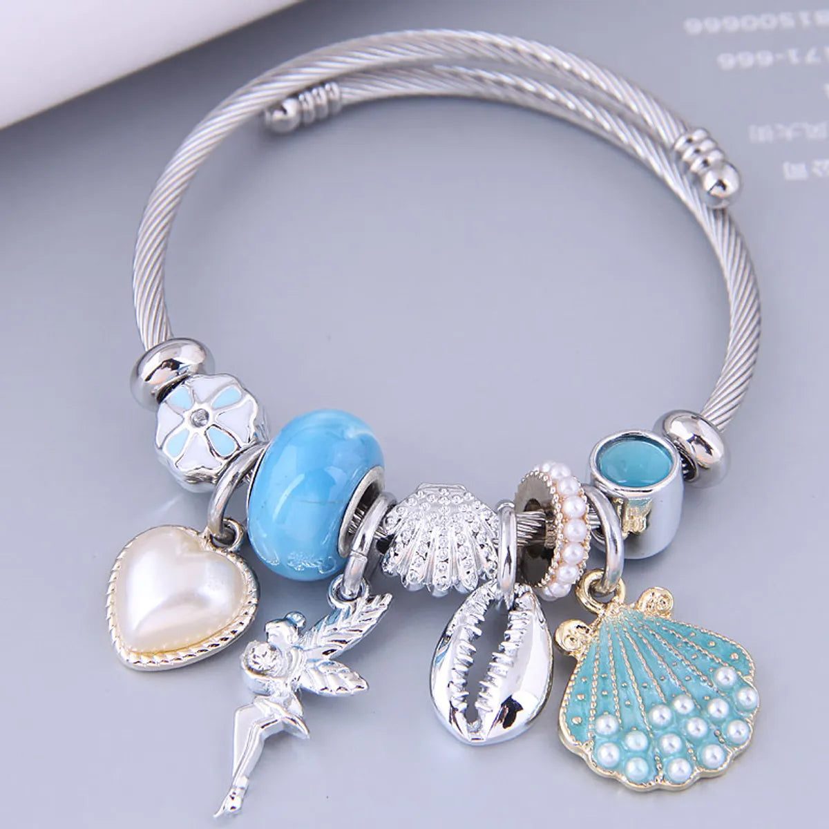 women's bracelets with luxury stones -Nihaojewelry Wholesale Jewelry Fashion Metal Peach Heart Angel Sea Shell Pendant Bracelet